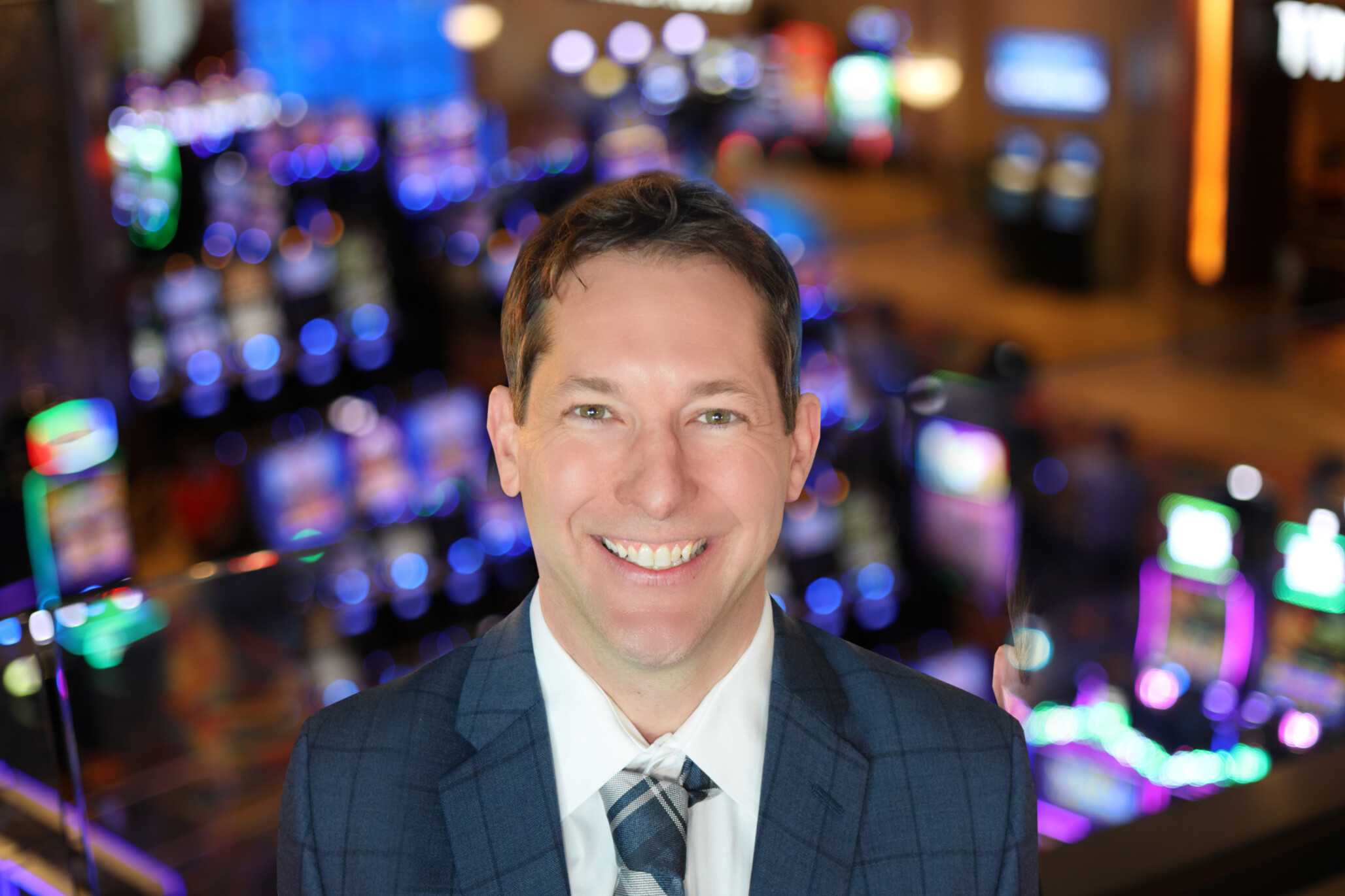 Benjamin Petell, Vice President of Non-Gaming Operations for Jamul Casino, standing in front of the vibrant casino floor.