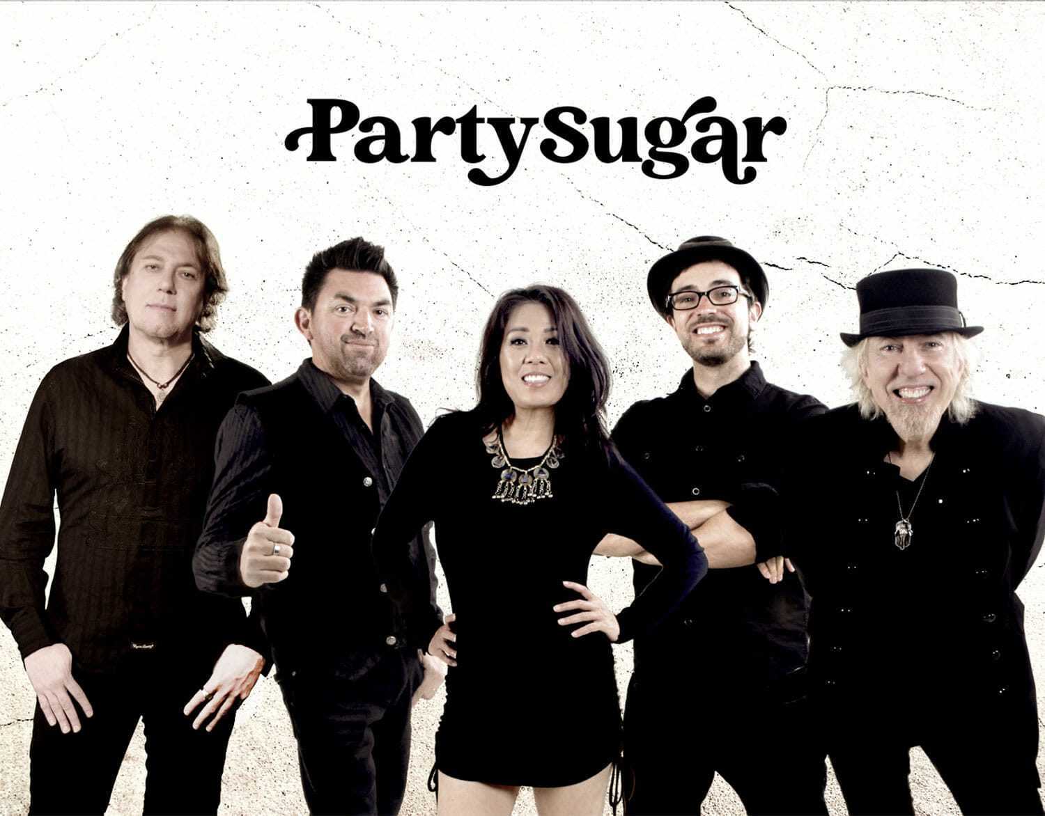 Party Sugar band group photo featuring five members dressed in black, smiling and posing against a light textured background.