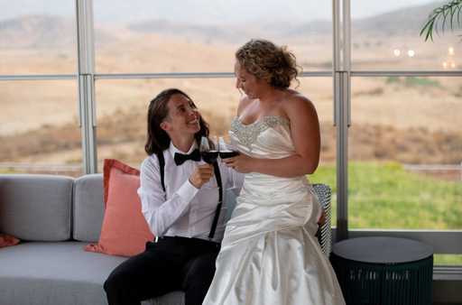 A beautiful married couple after a ceremony in San Diego's top wedding venue.