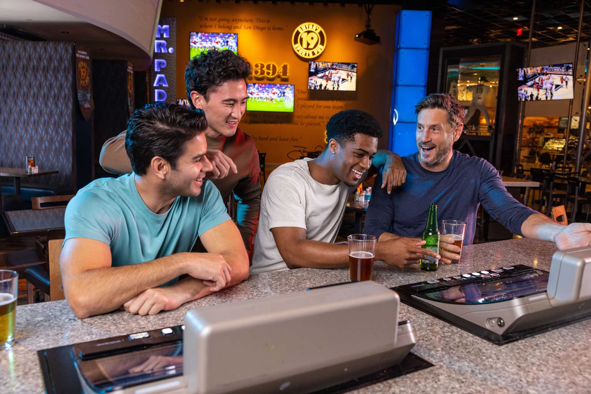 Four friends a Tony Gwynn's Sports Pub.