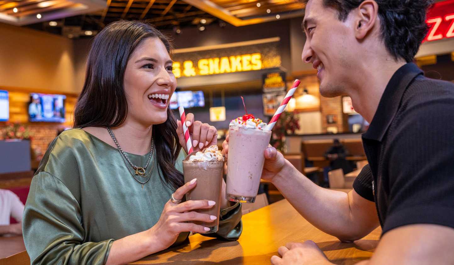 A couple enjoy some milkshakes at Jamul Marketplace.